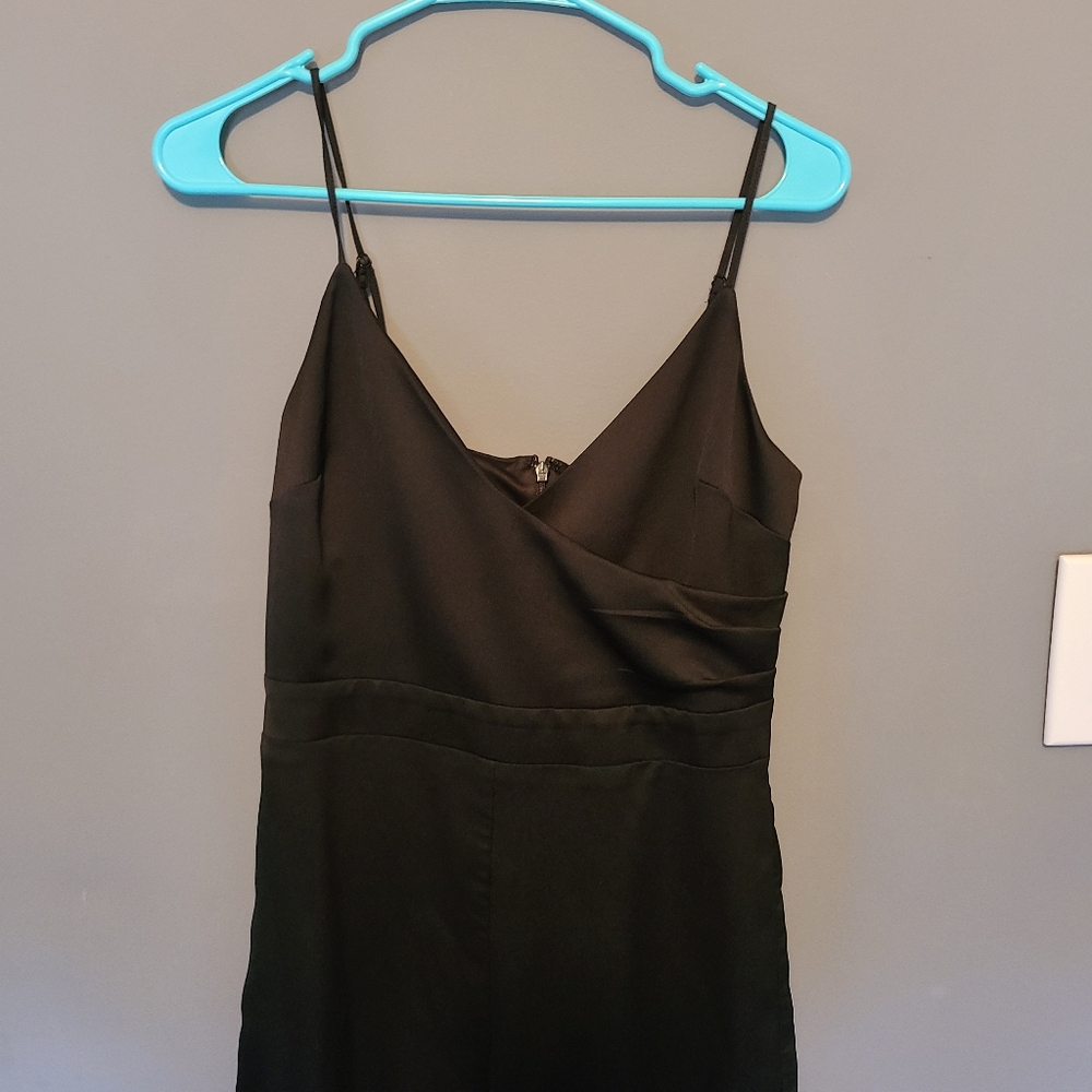 Black wide leg jumpsuit with side slit on both legs size Small